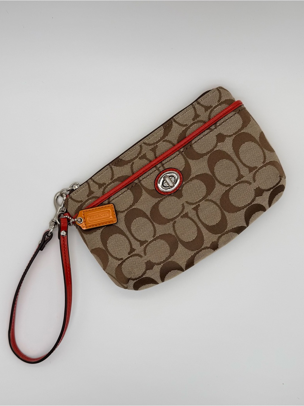 Coach Signature C Turnlock Wristlet Khaki Brown Orange Patent Y2K